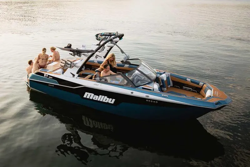 Slide: The Image of Manufacturer Provided Image: 2022 Malibu M220 boat with people enjoying on calm water. - 60