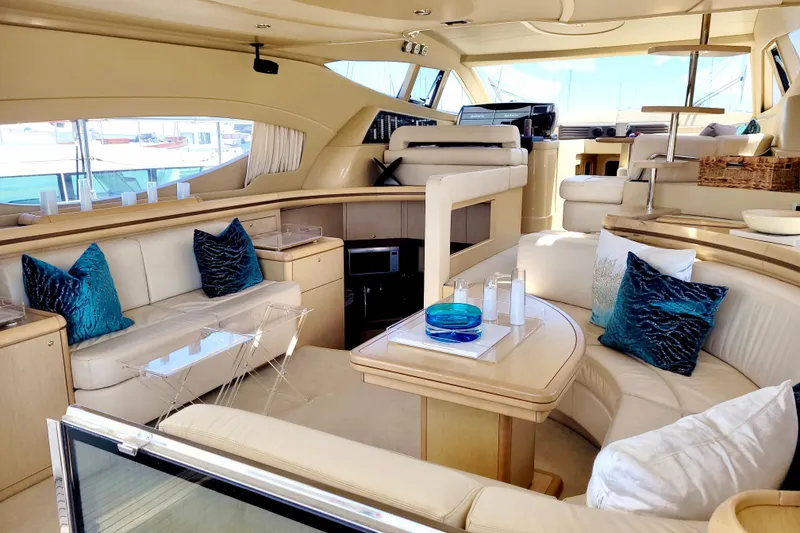 Slide: The Image of Luxurious interior of 2006 Ferretti Yachts 550 with elegant seating and decor. - 15