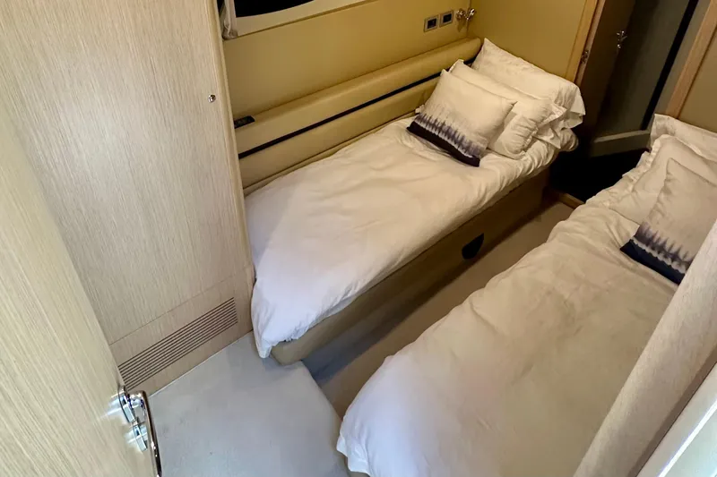 Slide: The Image of Twin cabin interior of 2006 Ferretti Yachts 550 with cozy bedding. - 21