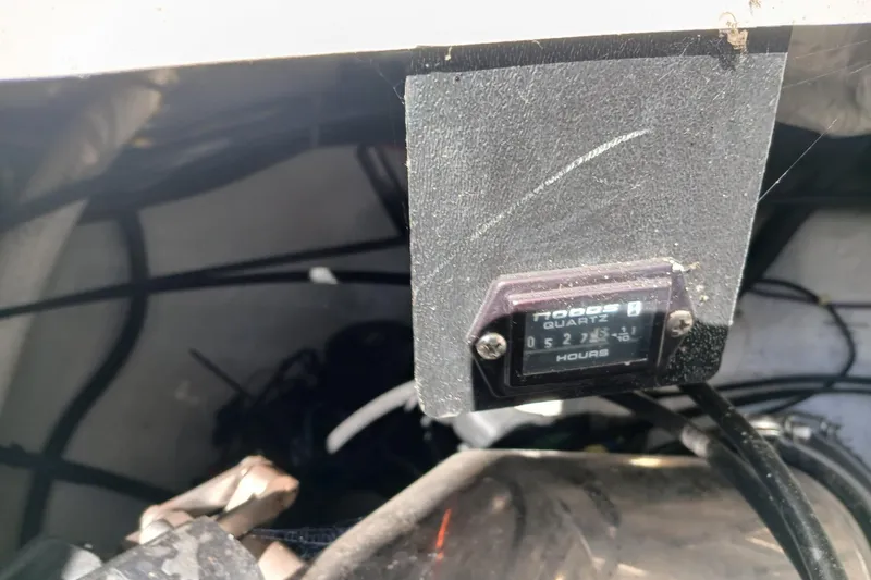 Slide: The Image of Hour meter display in a 1998 Cobalt 293 boat engine compartment. - 39