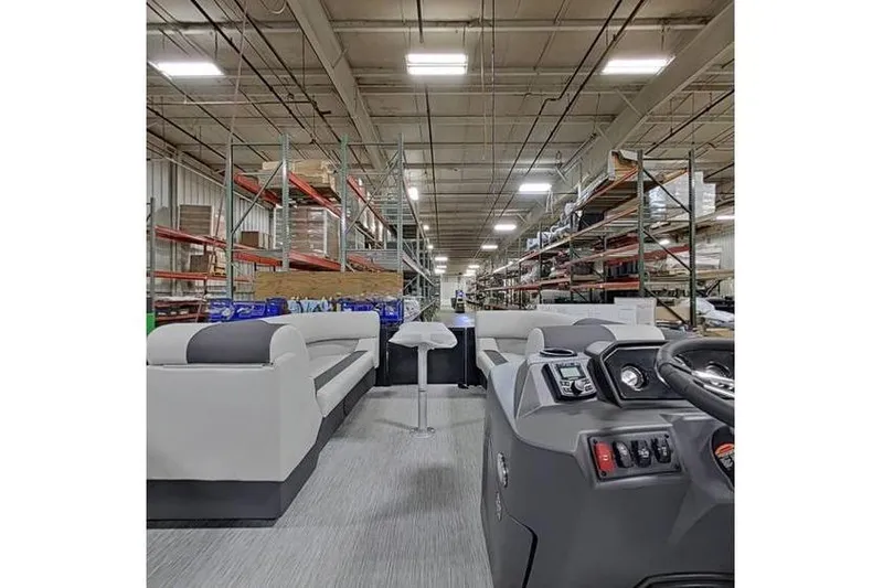 Slide: The Image of 2026 Bennington 20 SSR Quad Bench Tritoon with Yamaha 115 HP in warehouse setting. - 14