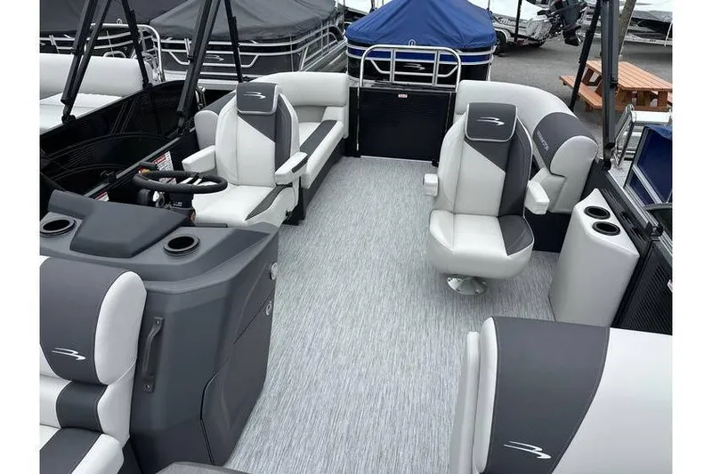 Slide: The Image of 2026 Bennington 20 SSR Quad Bench Tritoon interior with Yamaha 115 HP engine. - 21