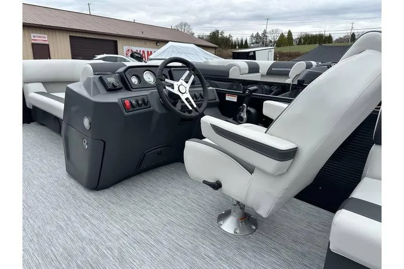 Slide: The Image of 2026 Bennington 20 SSR Quad Bench Tritoon interior with Yamaha 115 HP engine. - 27