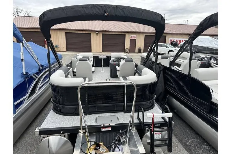 Slide: The Image of 2026 Bennington 20 SSR Quad Bench Tritoon with Yamaha 115 HP, docked and ready. - 29