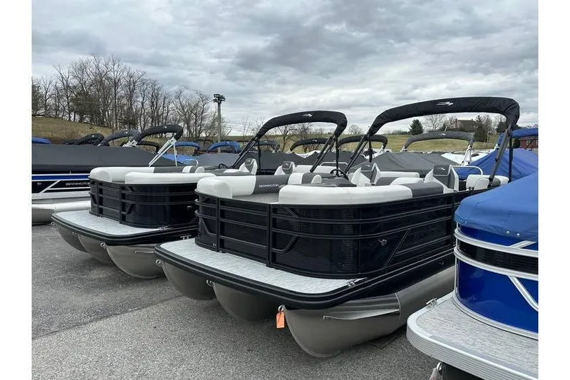 Slide: The Image of 2026 Bennington 20 SSR Quad Bench Tritoon with Yamaha 115 HP, in stock, displayed outdoors. - 35