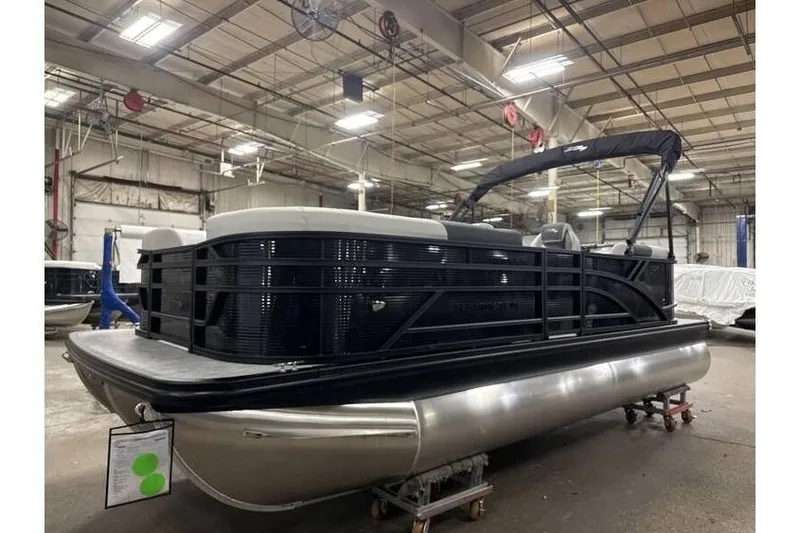 Slide: The Image of 2026 Bennington 20 SSR Quad Bench Tritoon with Yamaha 115 HP in stock, indoor view. - 6