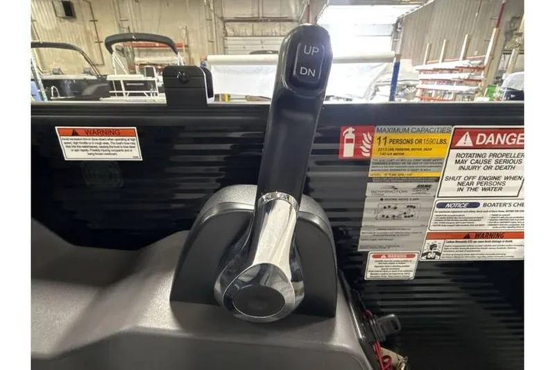 Slide: The Image of Throttle control of 2026 Bennington 20 SSR Quad Bench Tritoon with safety warnings visible. - 8