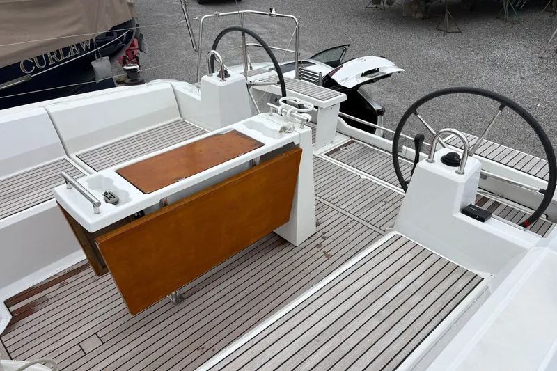 Slide: The Image of Beneteau Oceanis 38.1 yacht cockpit with dual steering wheels, 2021 model. - 21