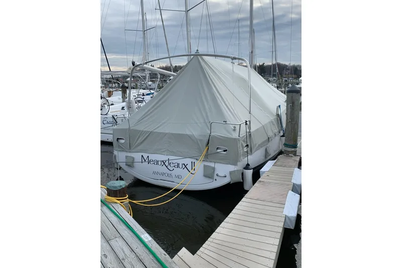 Slide: The Image of 2021 Beneteau Oceanis 38.1 sailboat docked, covered, in Annapolis marina. - 24