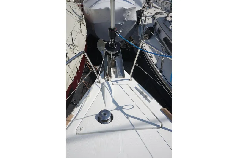 Slide: The Image of Bow view of 2021 Beneteau Oceanis 38.1 sailboat docked at marina. - 27
