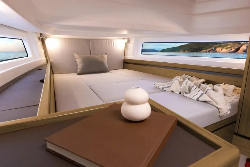 Slide: The Image of Luxurious interior of 2026 Aiata Wayfinder 38 yacht with cozy bed and scenic window view. - 10