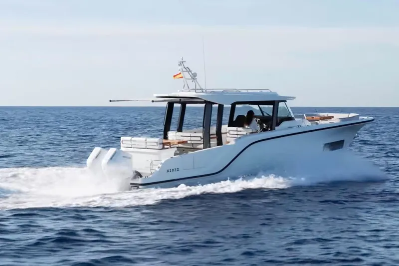 Slide: The Image of 2026 Aiata Wayfinder 38 Suntop cruising on open sea, showcasing sleek design and powerful engines. - 16