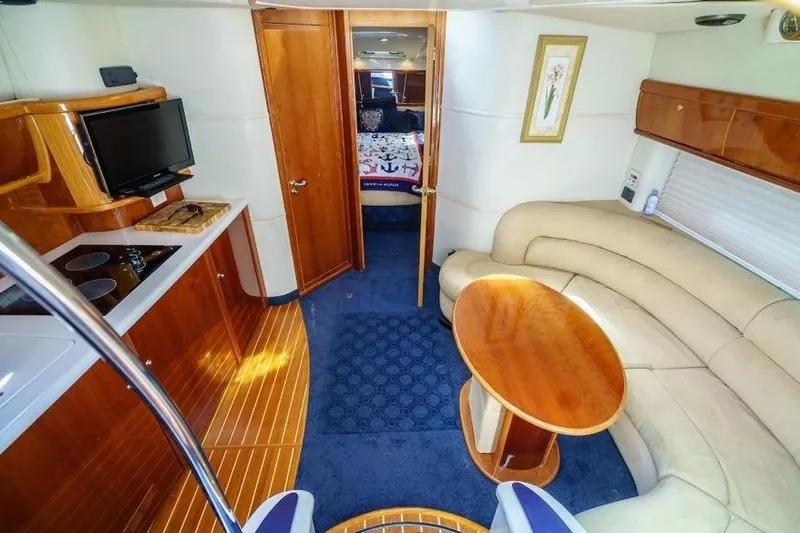 Slide: The Image of Luxurious interior of 2001 Sealine S41 Sports Cruiser with elegant seating and modern amenities. - 13