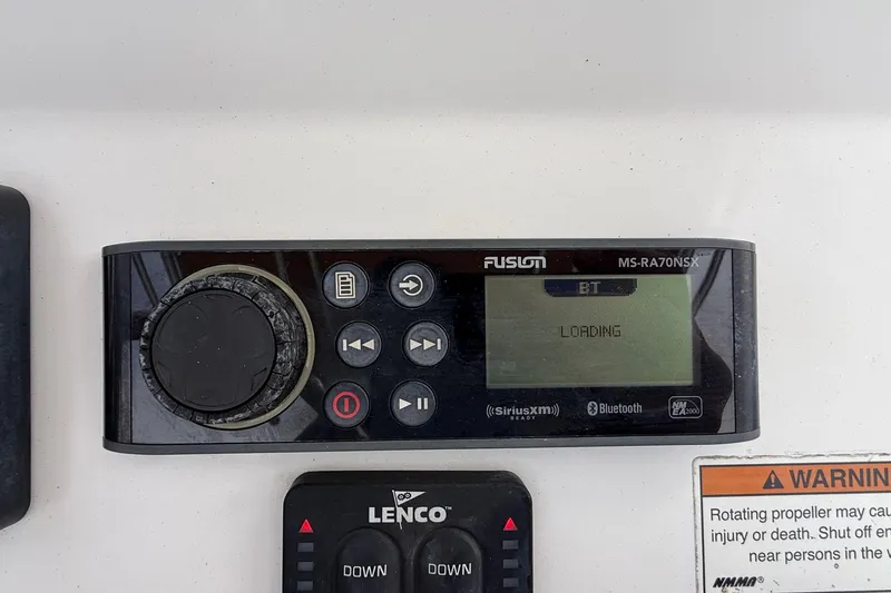 Slide: The Image of Fusion MS-RA70NSX stereo system on 2020 Edgewater 208CC boat dashboard. - 13