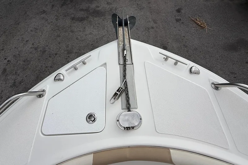 Slide: The Image of Bow of 2020 Edgewater 208CC boat with anchor and storage compartments. - 26