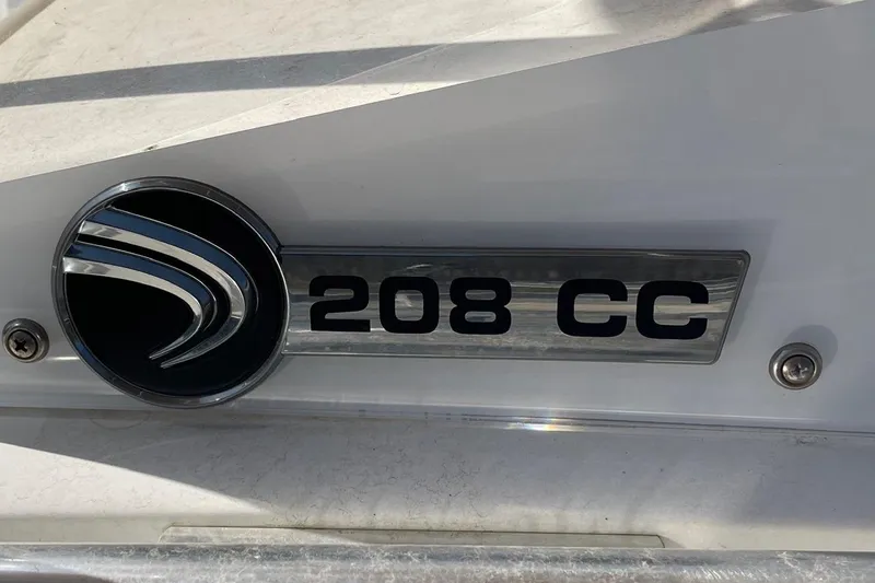Slide: The Image of Edgewater 208CC 2020 model emblem on a boat's exterior. - 34