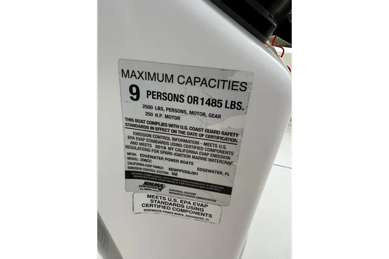 Slide: The Image of 2020 Edgewater 208CC capacity label, 9 persons or 1485 lbs, 250 HP motor. - 35