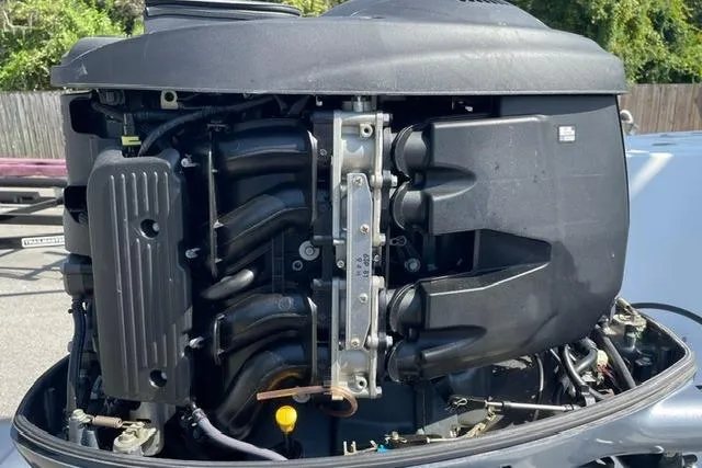 Slide: The Image of 2020 Edgewater 208CC boat engine, detailed view of internal components. - 40