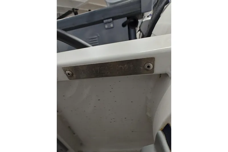 Slide: The Image of 2021 Highfield Classic 310 FCT boat with identification plate, close-up view. - 6