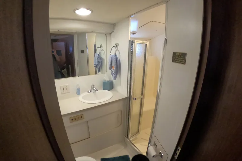Slide: The Image of Bathroom interior of 1987 Hatteras 54 Motor Yacht with sink and shower. - 17
