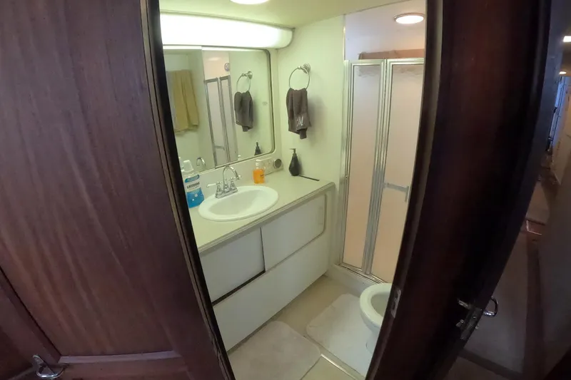 Slide: The Image of Bathroom interior of 1987 Hatteras 54 Motor Yacht with sink and shower. - 28