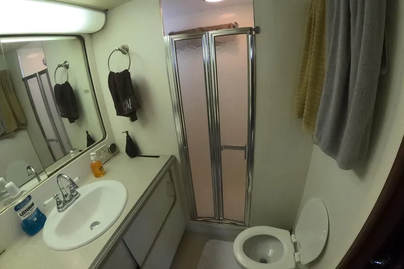 Slide: The Image of Bathroom interior of 1987 Hatteras 54 Motor Yacht with shower, sink, and toilet. - 29
