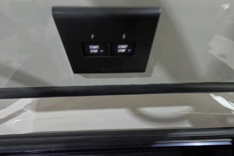 Slide: The Image of 2024 Tidewater start/stop button panel on a sleek surface. - 21