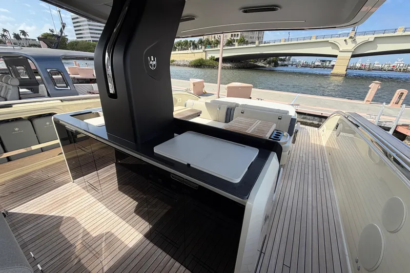 Slide: The Image of Luxurious 2024 Invictus TT460 yacht interior with sleek design and waterfront view. - 11