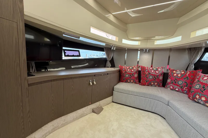 Slide: The Image of Luxurious interior of 2024 Invictus TT460 yacht with elegant seating and vibrant cushions. - 27