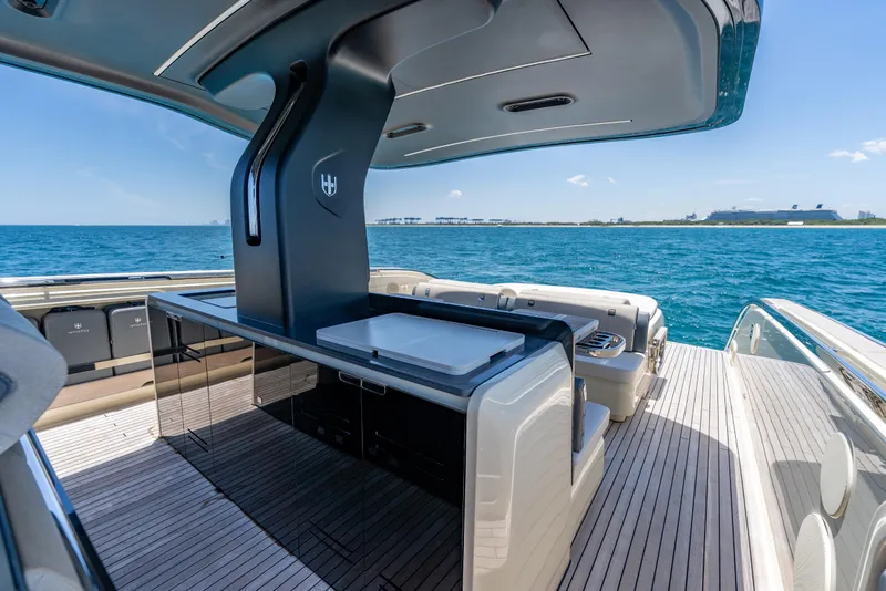 Slide: The Image of Luxurious 2024 Invictus TT460 yacht interior with ocean view and sleek design. - 43