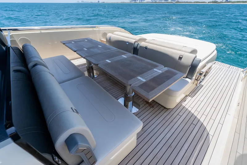 Slide: The Image of Luxurious seating area on 2024 Invictus TT460 yacht with ocean view. - 50