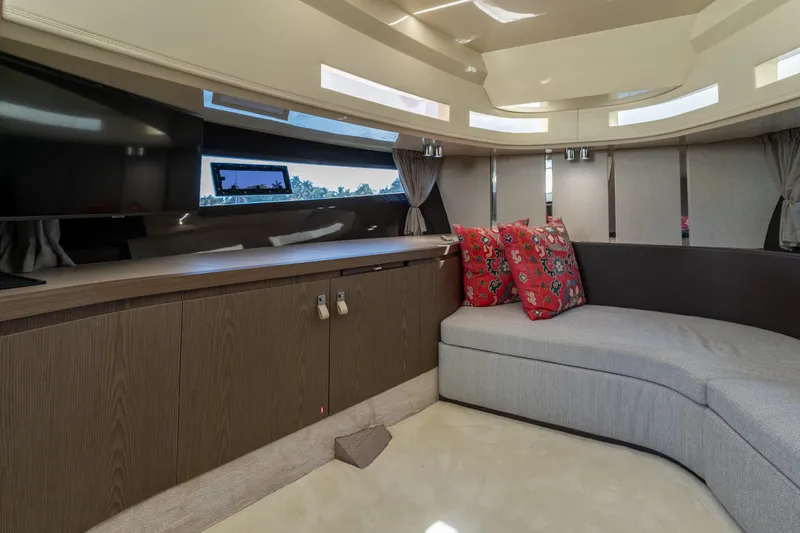 Slide: The Image of Luxurious interior of 2024 Invictus TT460 yacht with modern seating and vibrant cushions. - 62