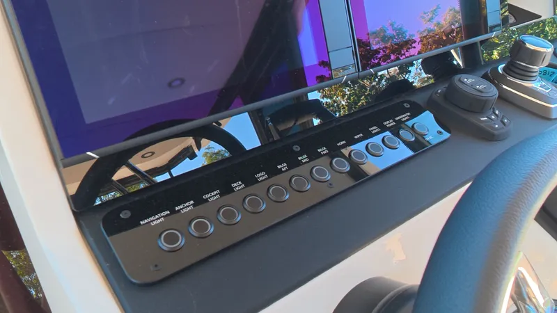 Slide: The Image of The image shows the dashboard of a Saxdor 320 GTO with modern controls and screens. - 18