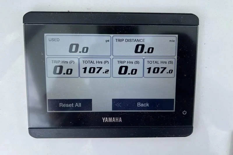 Slide: The Image of Yamaha display showing trip data on a 2026 Sea Hunt Gamefish 25 boat. - 21
