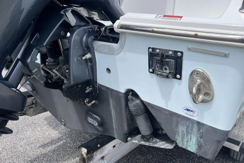 Slide: The Image of Close-up of a 2026 Sea Hunt Gamefish 25 boat's engine mount and transom details. - 25