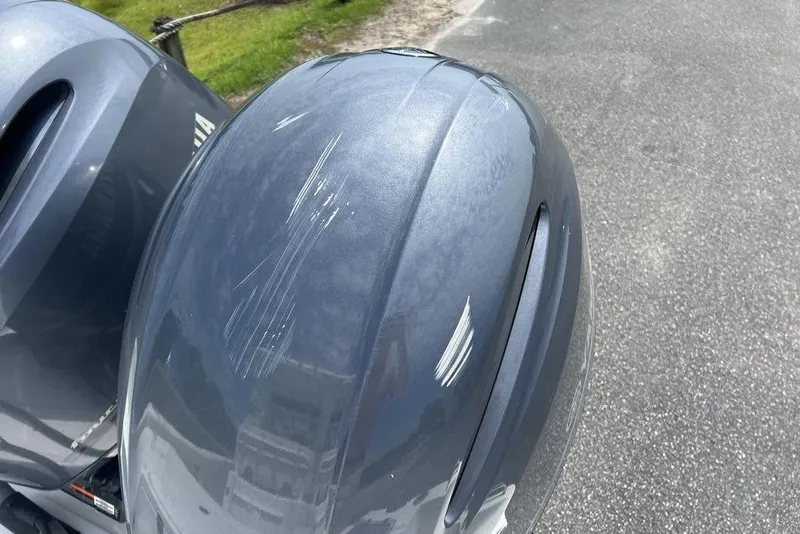 Slide: The Image of Scratched outboard motor on a 2026 Sea Hunt Gamefish 25 boat. - 6