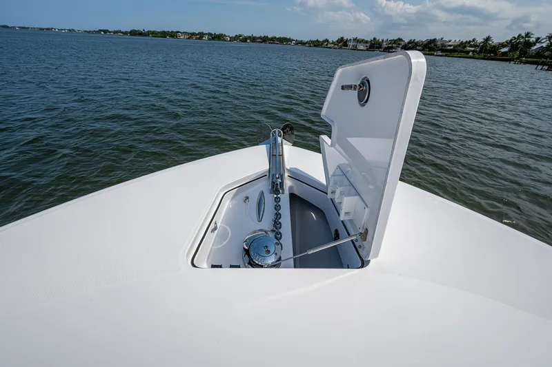 Slide: The Image of HCB 48 Campeon 2025 anchor compartment on calm water. - 17