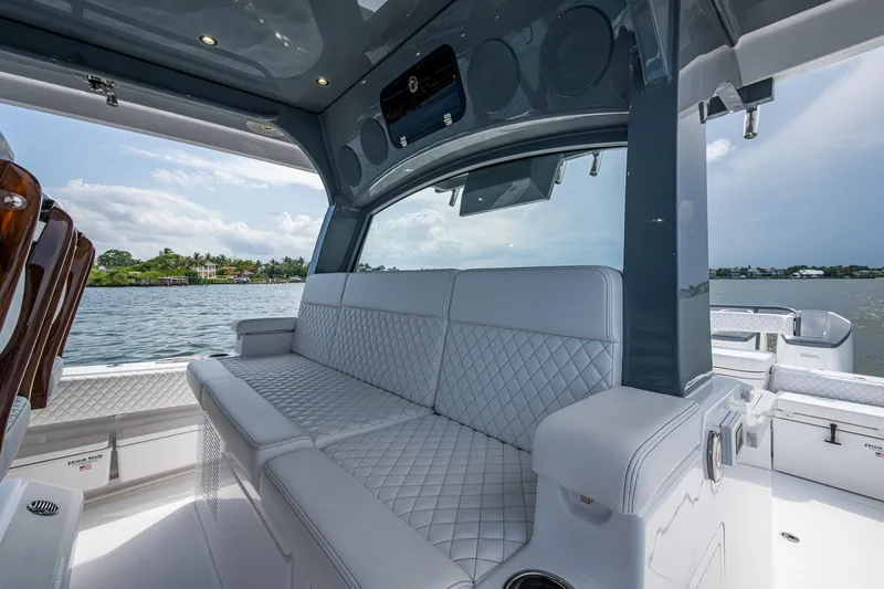 Slide: The Image of Luxurious interior of 2025 HCB 48 Campeon boat with quilted seating. - 32