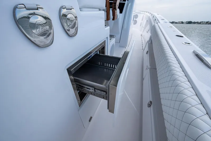 Slide: The Image of HCB 48 Campeon 2025 with open storage compartment on deck. - 48