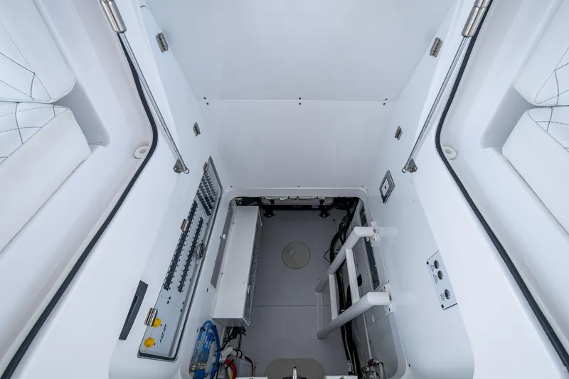 Slide: The Image of Interior view of 2025 HCB 48 Campeon boat, showcasing technical equipment and clean design. - 62