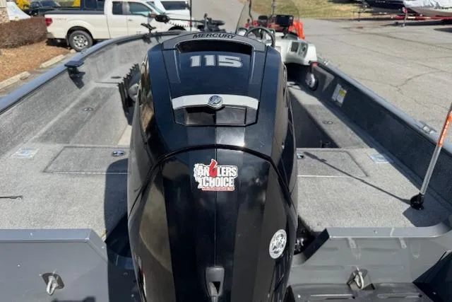 Slide: The Image of 2018 Tracker Pro Guide V-175 SC boat with Mercury 115 engine, parked outdoors. - 6