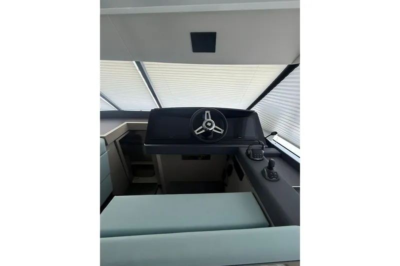 Slide: The Image of 2024 Fountaine Pajot MY6 helm station with modern steering and controls. - 41