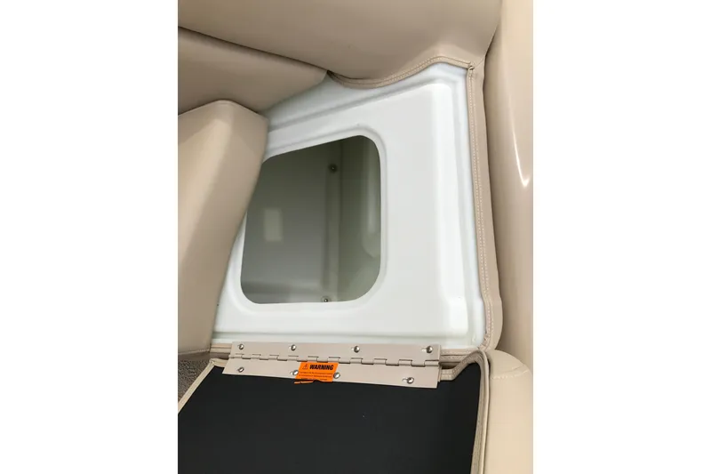 Slide: The Image of Interior compartment of 2008 South Bay 822CR TT boat with beige upholstery. - 10