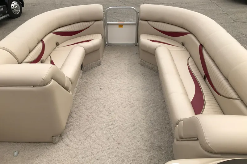 Slide: The Image of Luxurious interior of 2008 South Bay 822CR TT pontoon boat with beige and maroon seating. - 22