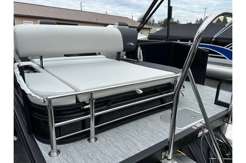 Slide: The Image of 2026 Bennington 22 SSB SwingBack Tritoon with Yamaha 150 Hp, featuring sleek seating. - 20