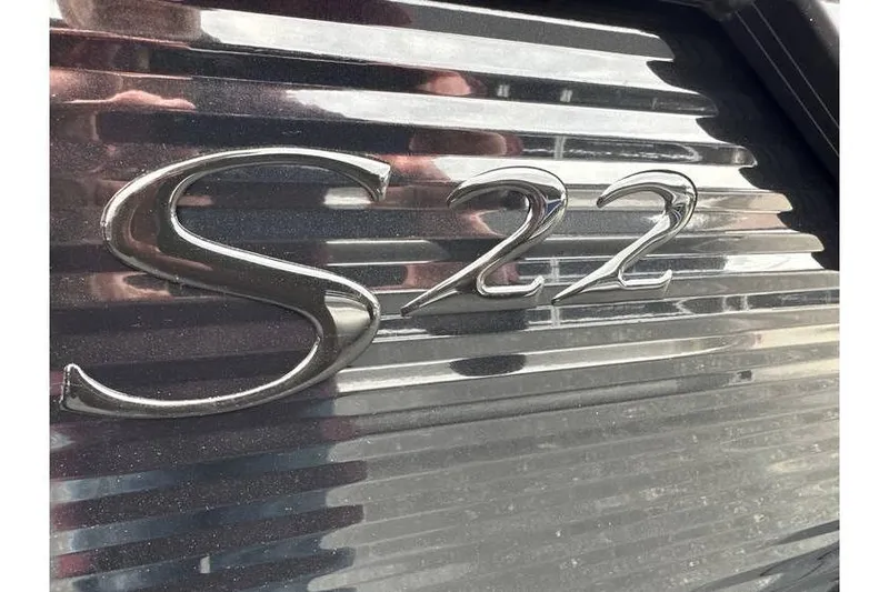 Slide: The Image of Close-up of Bennington 22 SSB Tritoon emblem on metallic surface, 2026 model. - 35