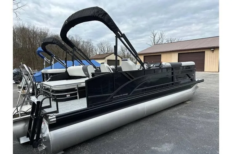 Slide: The Image of 2026 Bennington 22 SSB SwingBack Tritoon with Yamaha 150 Hp, parked outdoors. - 36