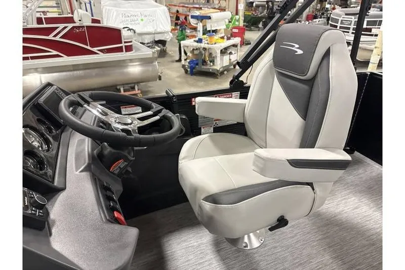 Slide: The Image of Captain's chair and steering console of 2026 Bennington 22 SSB SwingBack Tritoon. - 5