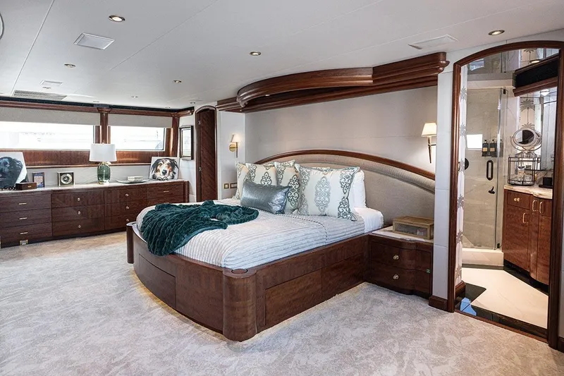 Slide: The Image of Luxurious bedroom on 2003 Cheoy Lee Trideck yacht with elegant wood furnishings. - 11