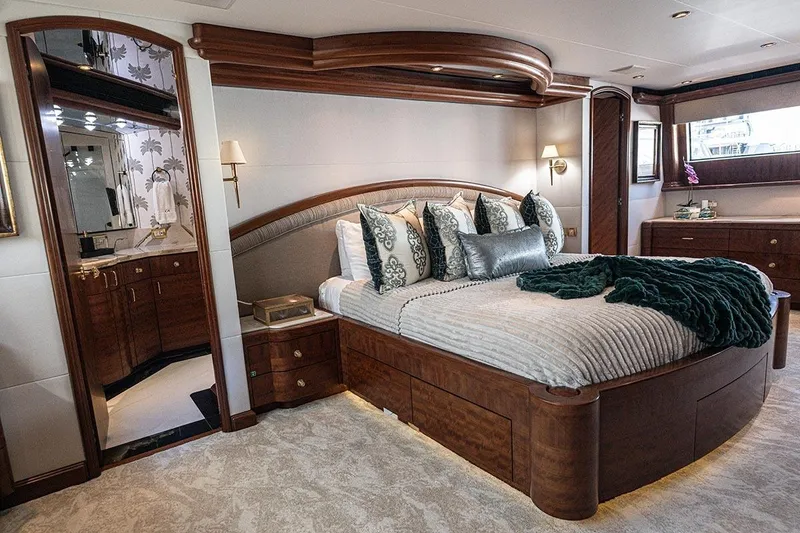 Slide: The Image of Luxurious bedroom interior on 2003 Cheoy Lee Trideck yacht with elegant wood furnishings. - 13